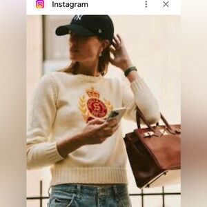 Sporty & Rich NY Crest Knitted Sweater in cream cotton.